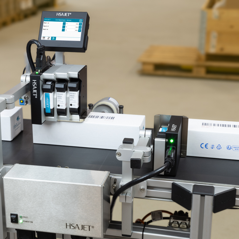 MCX Satellite configuration with two individual printheads printing on two sides of a box simultaneously